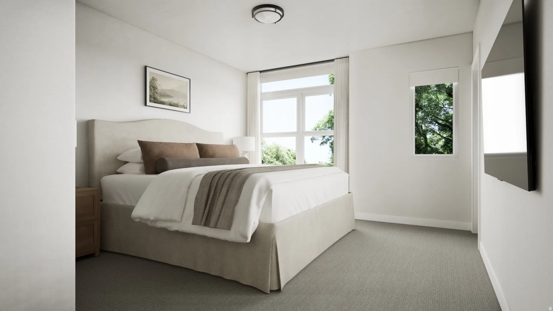 Bright bedroom featuring light-colored carpeting and white walls