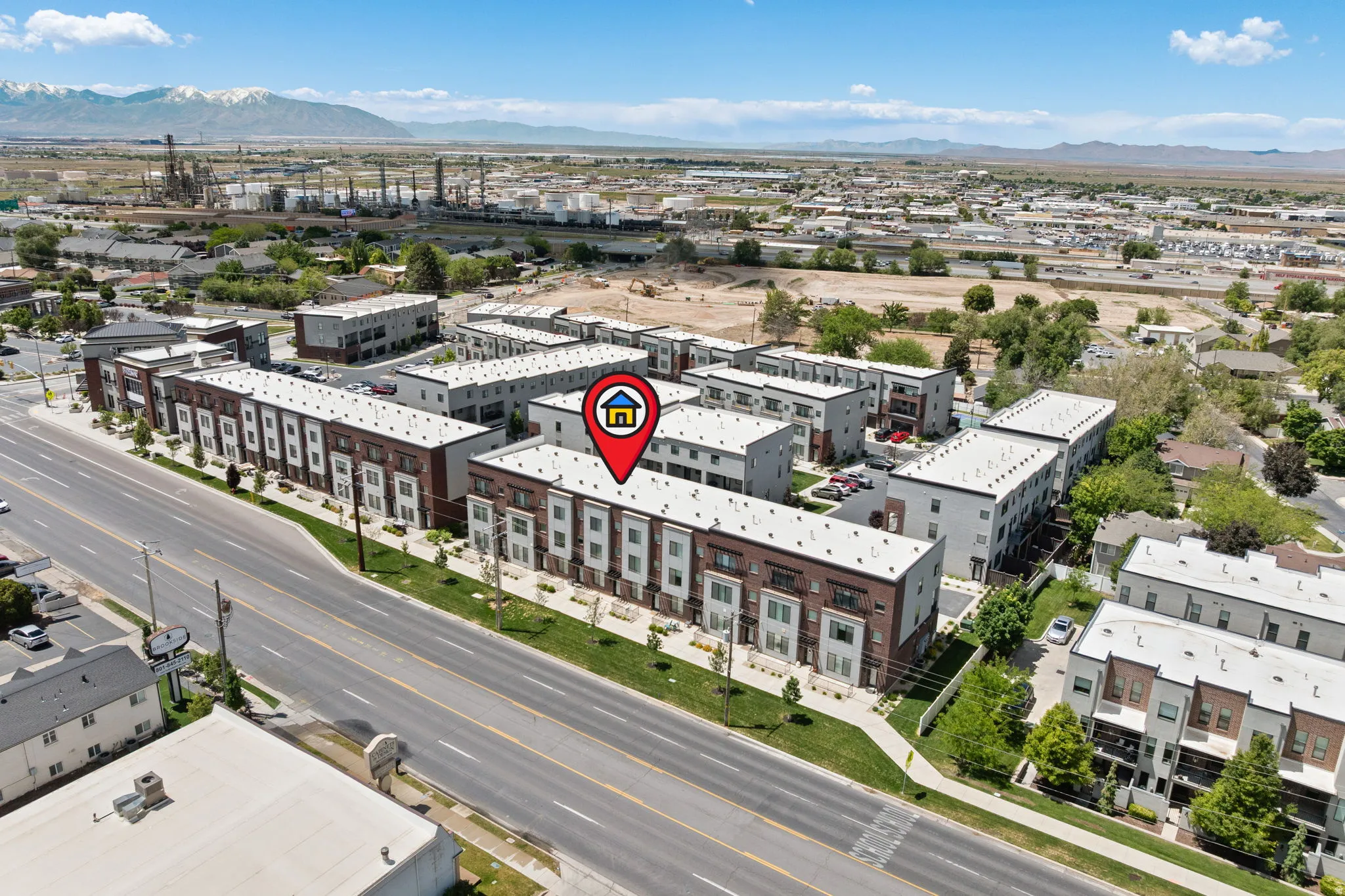 Modern townhome community featuring multi-story units with contemporary facades