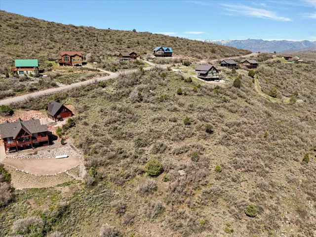 Fall views. Expansive hillside parcel featuring natural vegetation and distant mountain ranges