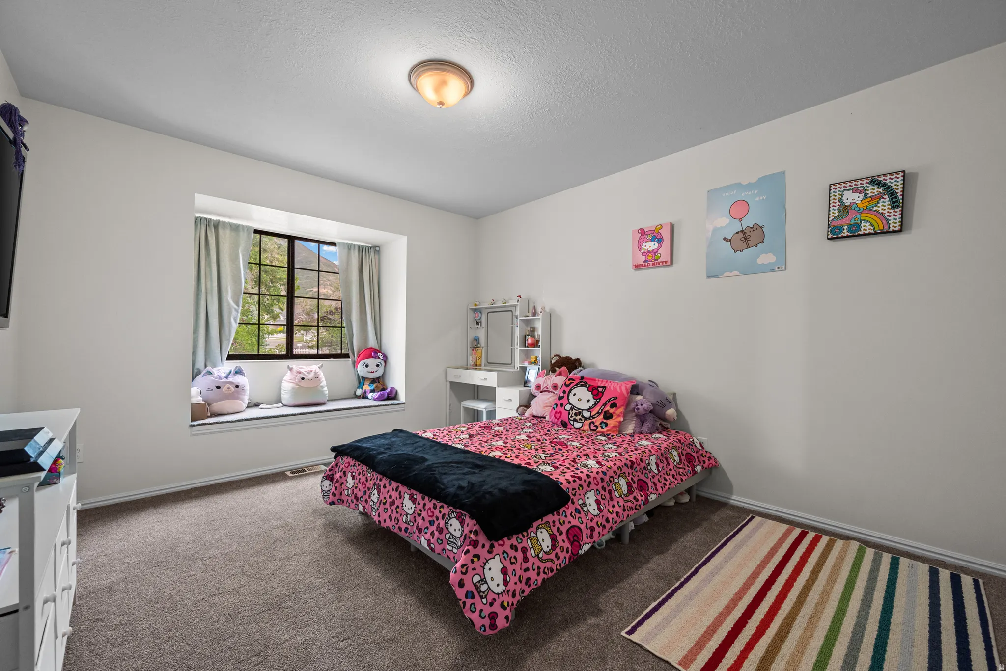 Recessed window with multi-pane grid, wall-to-wall carpeting, and a flush mount ceiling light
