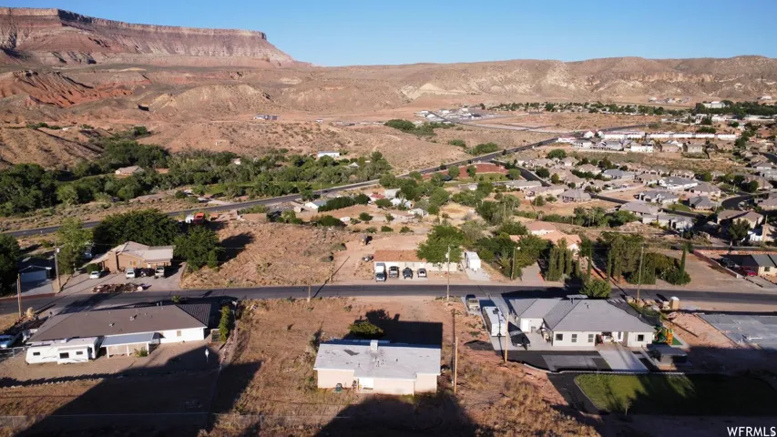 Expansive aerial perspective showcasing a neighborhood with diverse residential structures