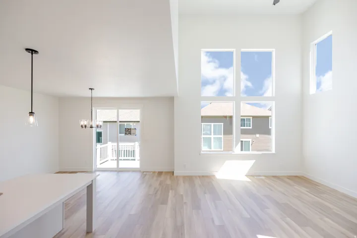High ceilings with abundant natural light through multiple windows