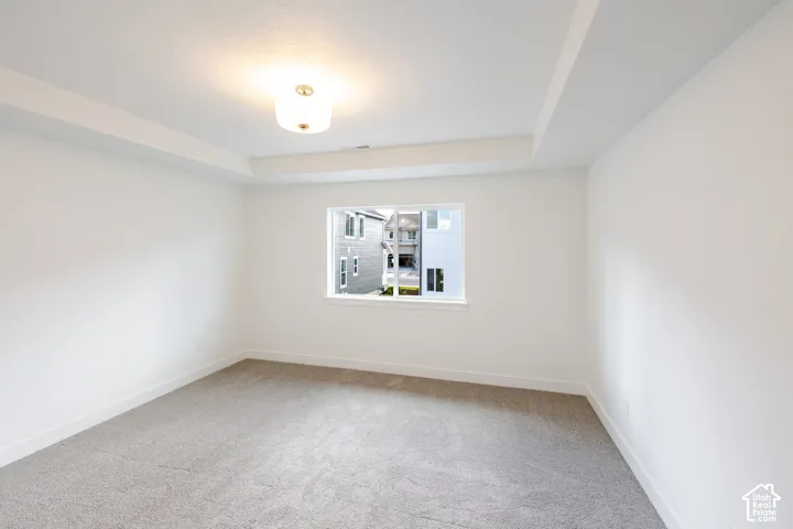 Recessed ceiling detail with a flush mount light fixture