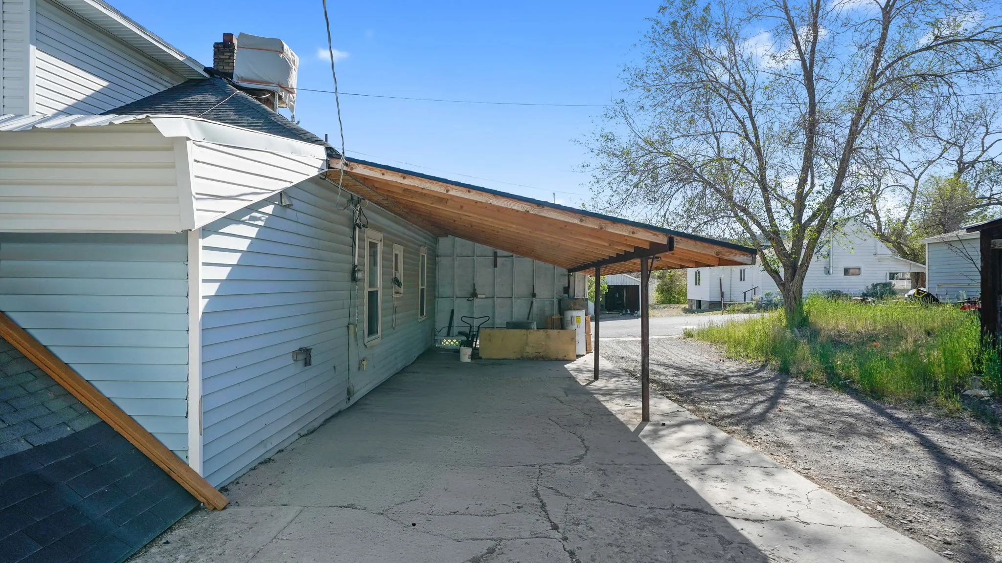 Concrete patio with an attached covered awning