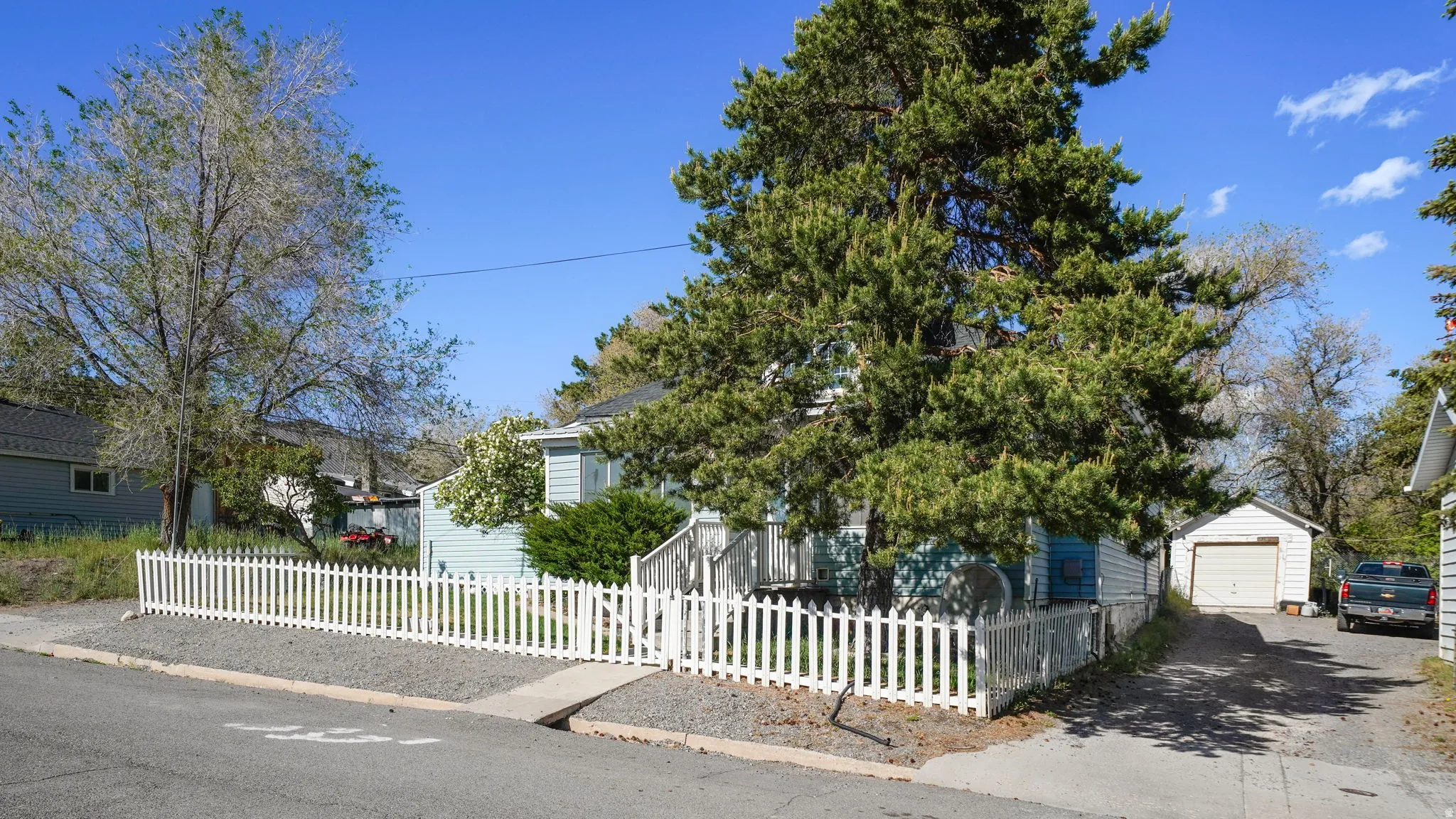 Light blue siding exterior with white trim