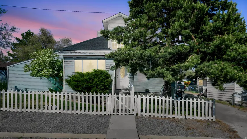 Classic siding exterior with an asphalt shingle roof