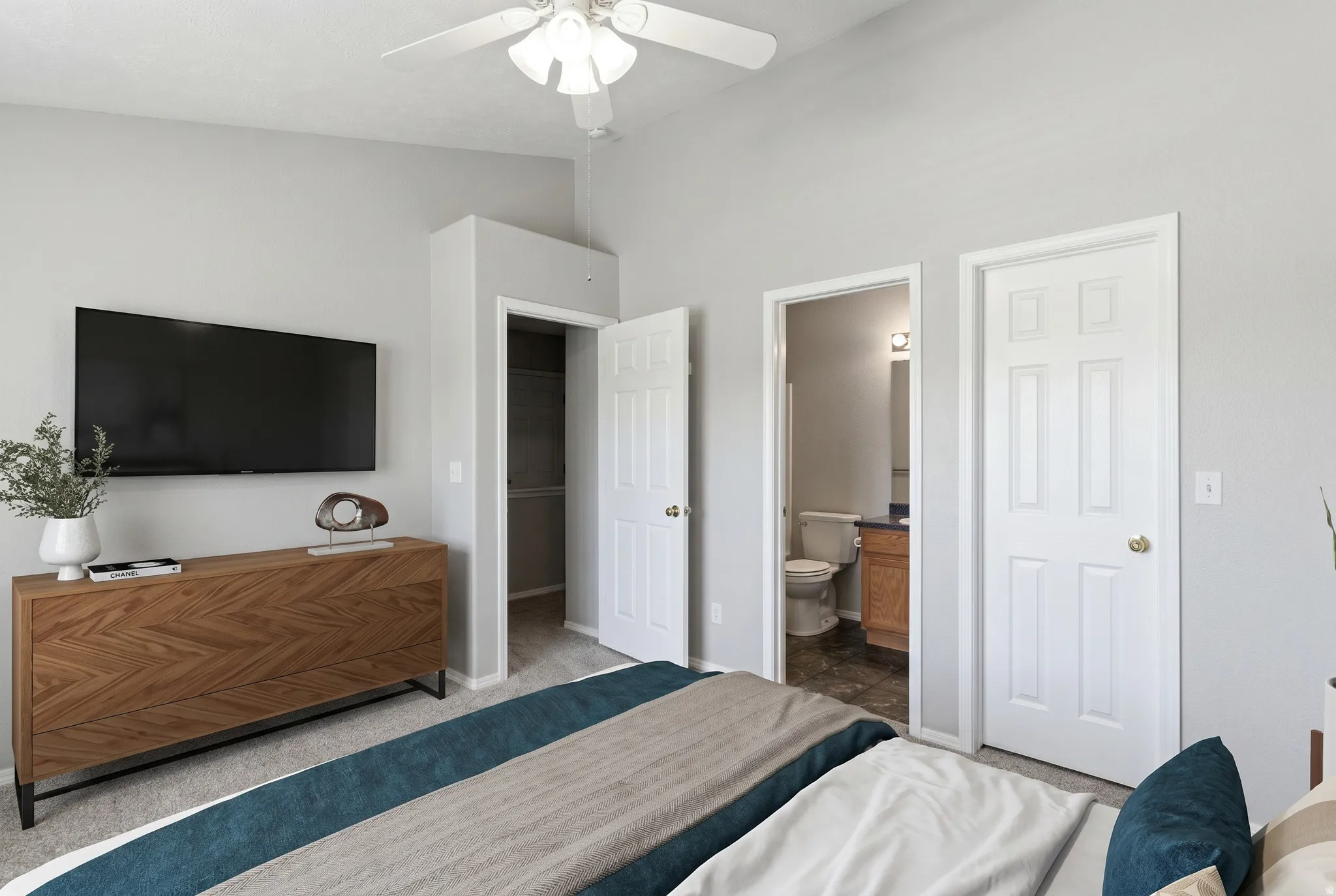 Light gray walls complementing neutral carpeting