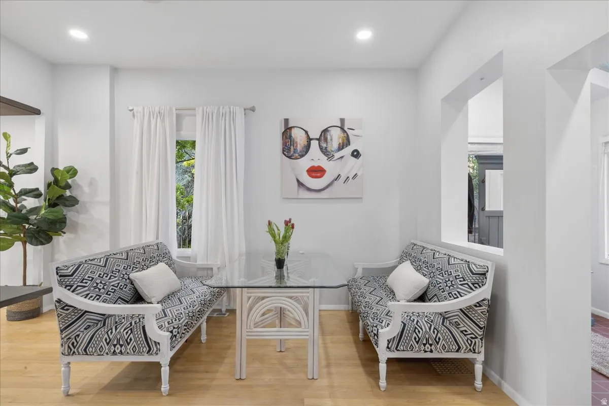 Bright interior space featuring light wood-finish flooring