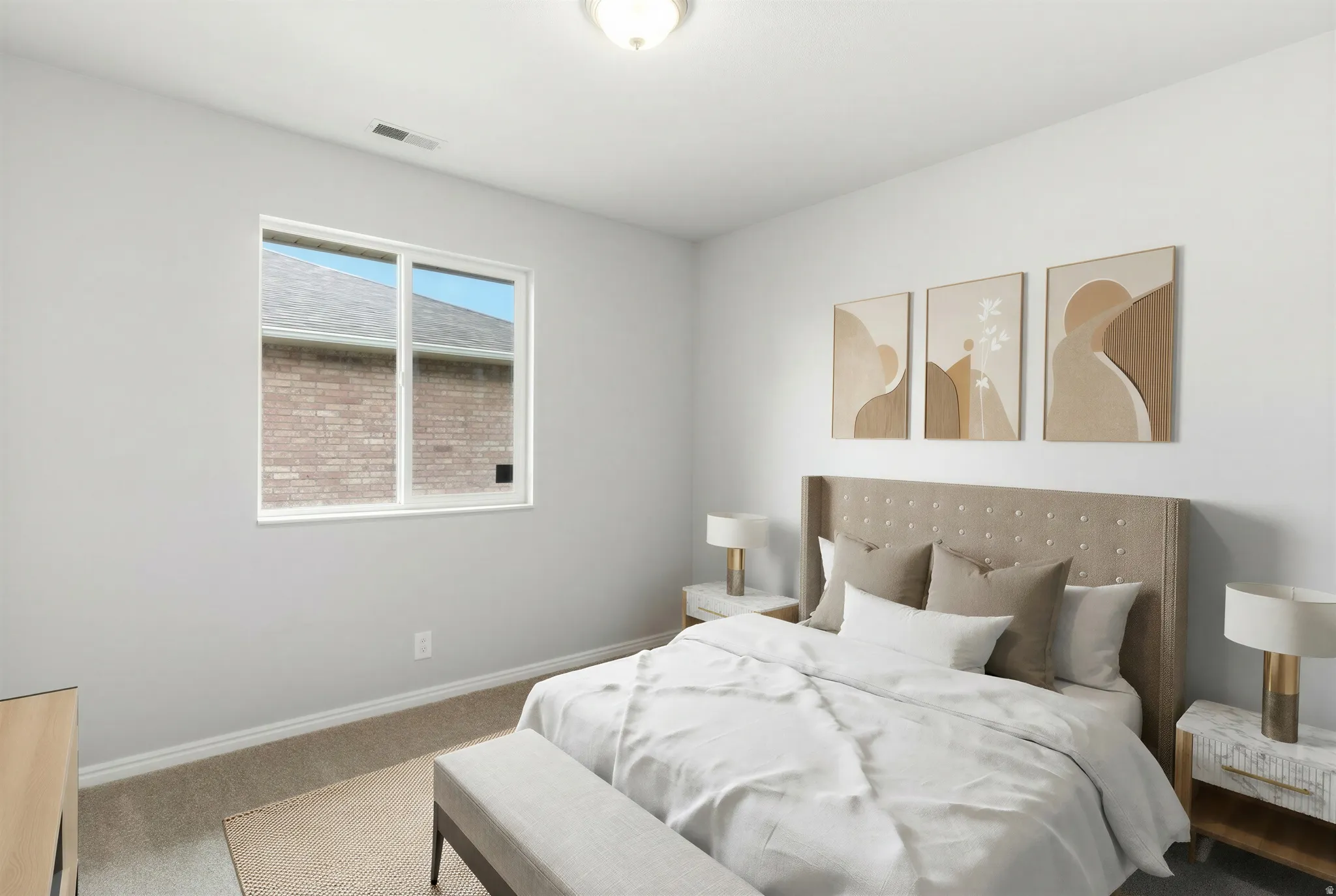 Neutral-toned interior featuring light gray walls and carpeted flooring