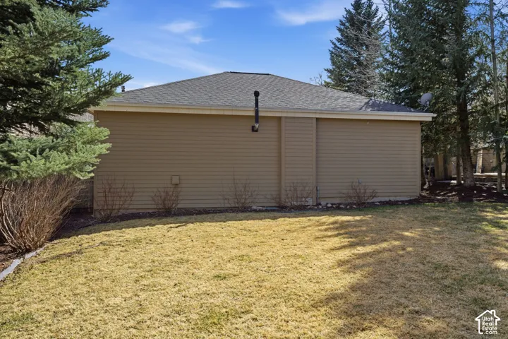 Exterior siding with a shingled roof