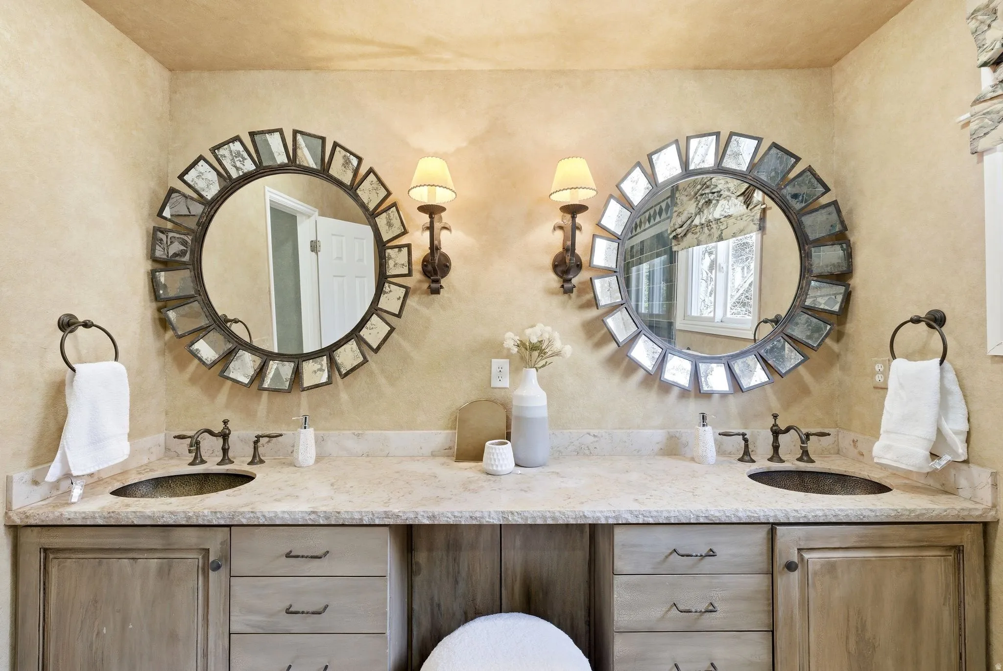 Dual vanity with integrated sinks and a light-toned countertop
