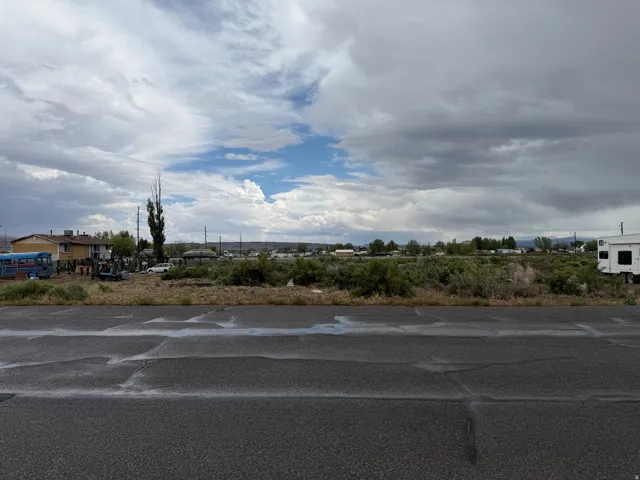 Expansive undeveloped land featuring natural vegetation and flat topography