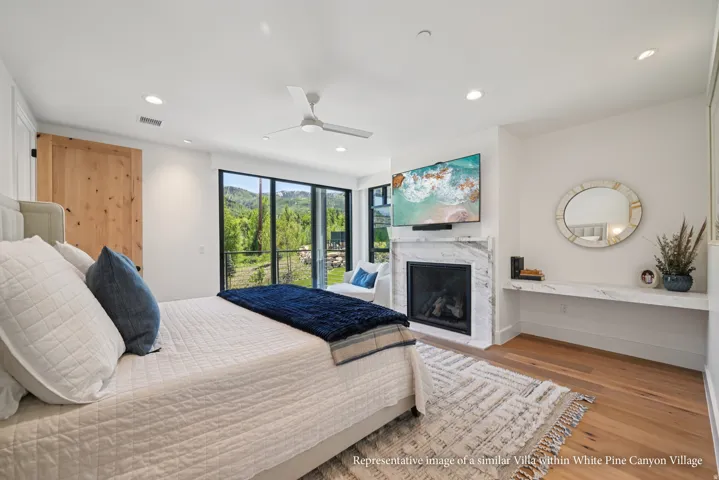 Hardwood flooring, recessed lighting, and a modern ceiling fan