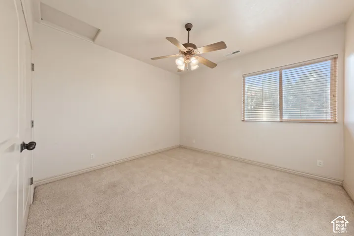 Neutral-toned carpeting throughout