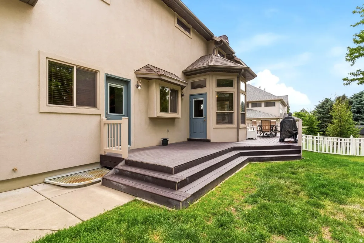 Expansive rear deck featuring a multi-level design and composite decking
