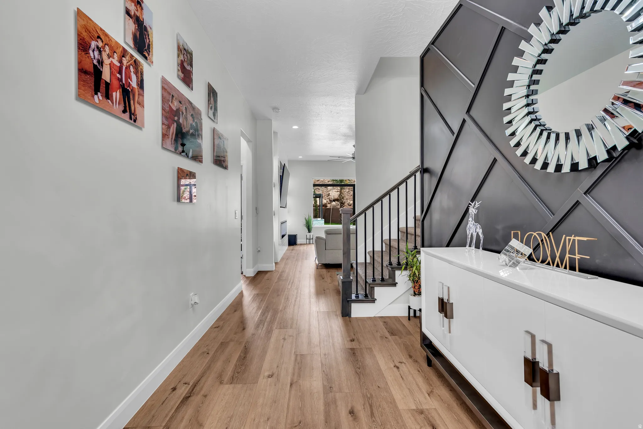 Hardwood-finish flooring extending through the hallway