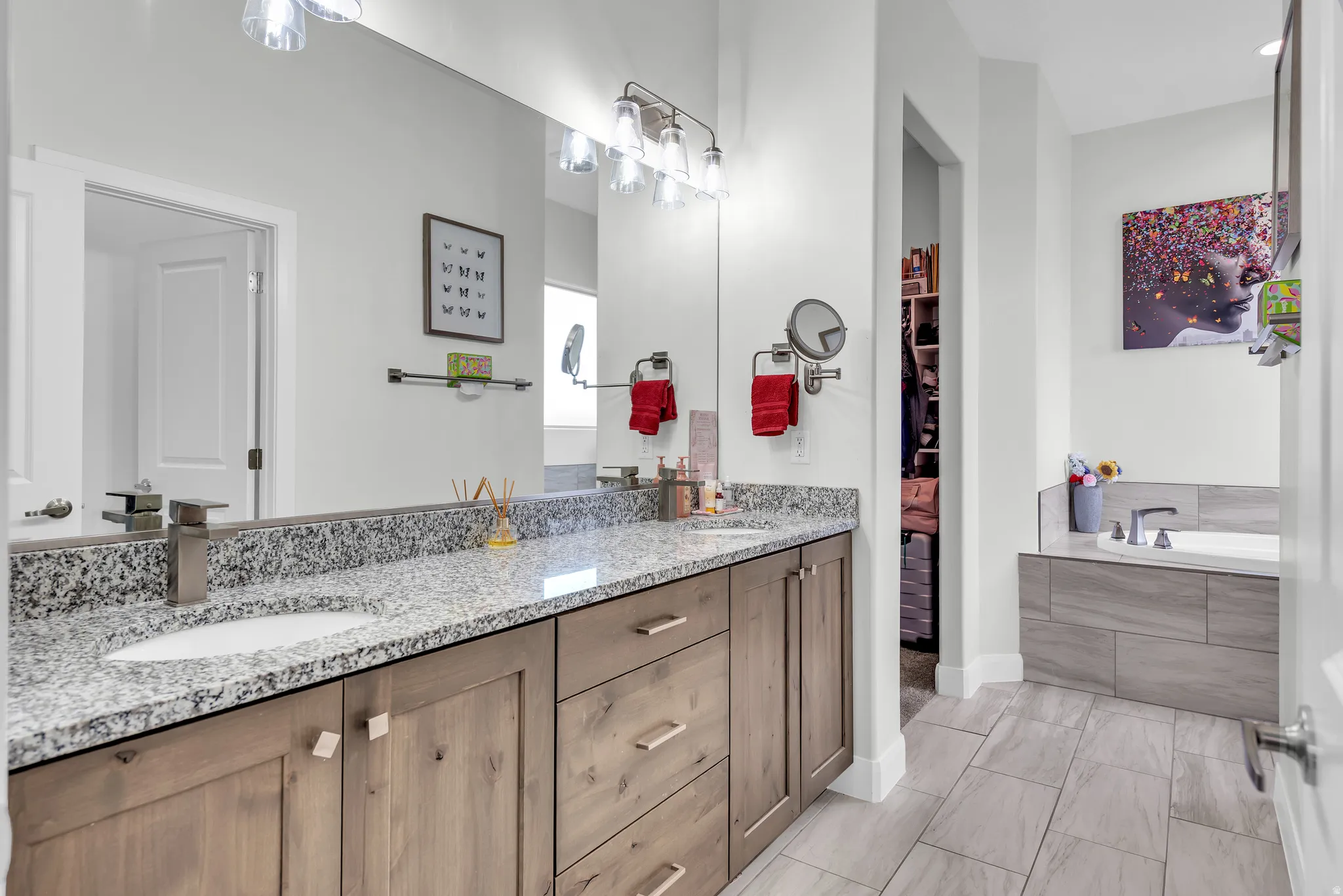 Dual vanity with granite countertop and integrated sinks