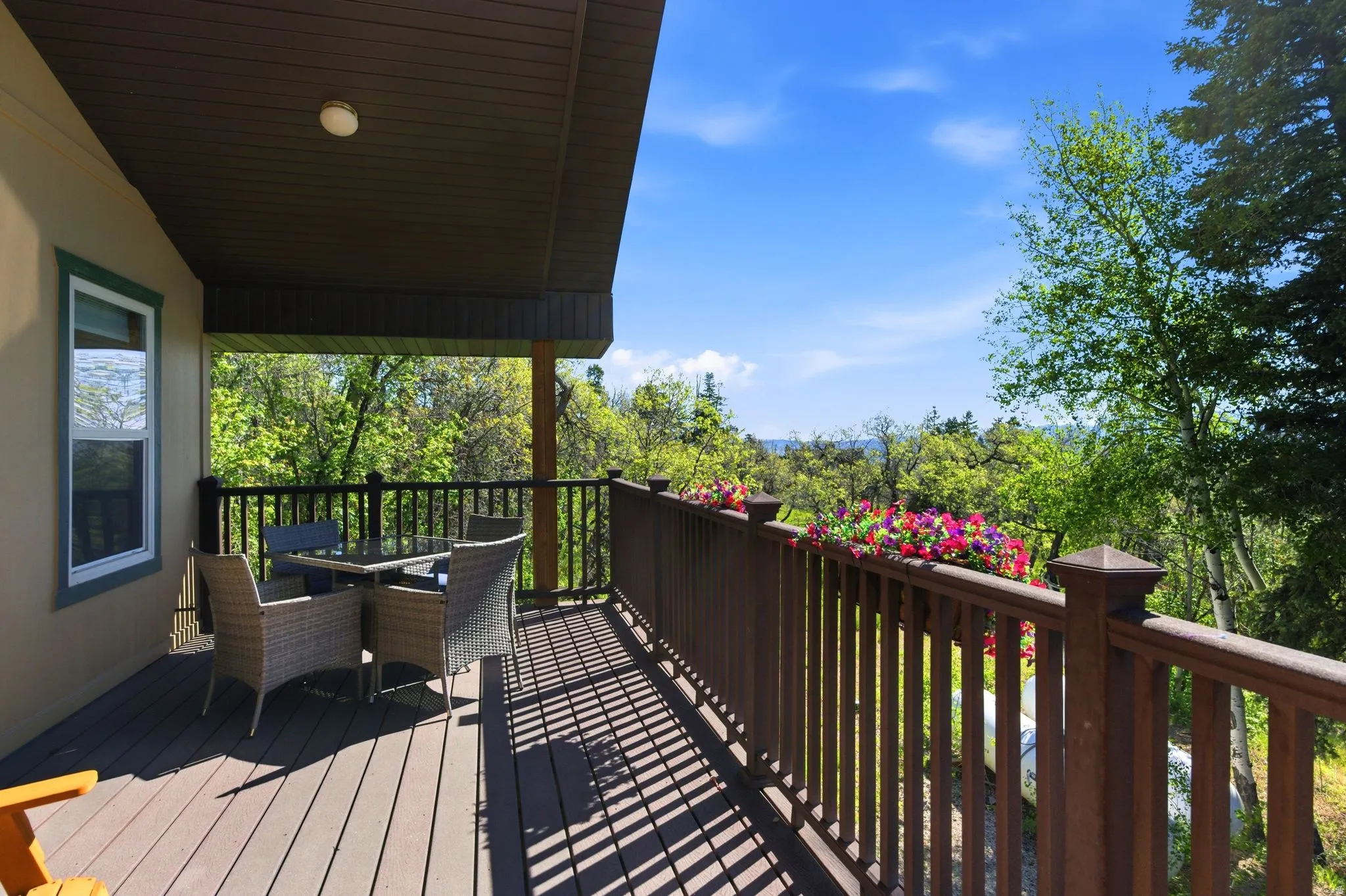 Expansive outdoor deck with a durable composite surface