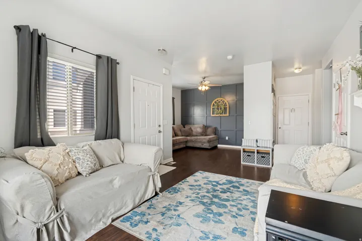 Open-concept living space featuring wood-finish flooring