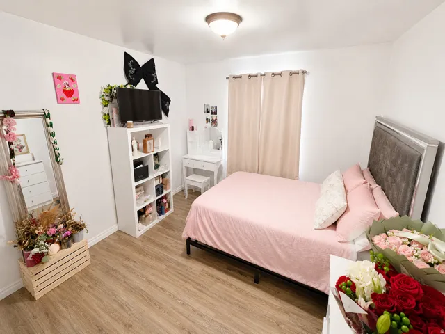 Neutral wall finishes with wood-finish flooring
