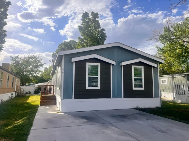 Blue and dark gray exterior with white trim
