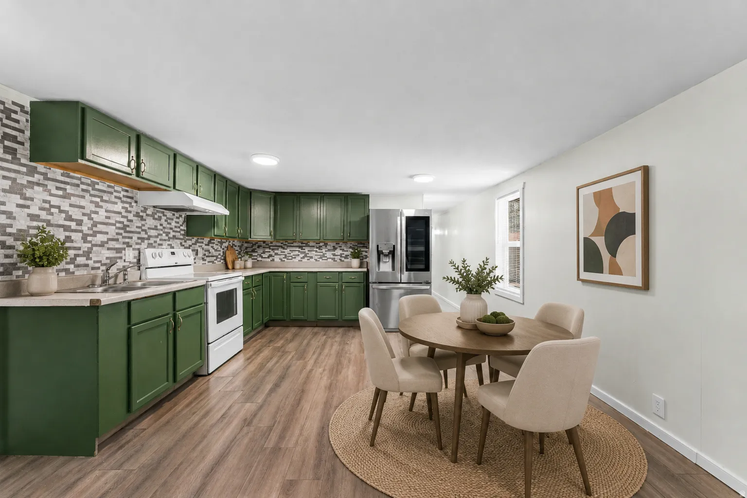 Kitchen featuring dark green cabinetry, white appliances, a mosaic tile backsplash, and wood-finish flooring