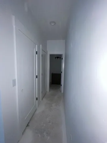 Upstairs Hallway to 1/2 Bath