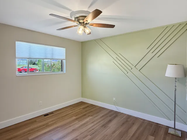 Accent wall featuring geometric panel molding