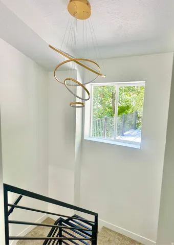 Elegant contemporary chandelier with gold-tone accents