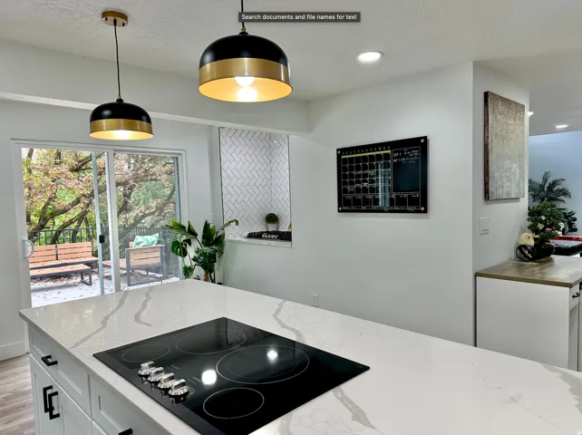 This view shows the gas cooktop, which is accessible if the bar countertop is removed.