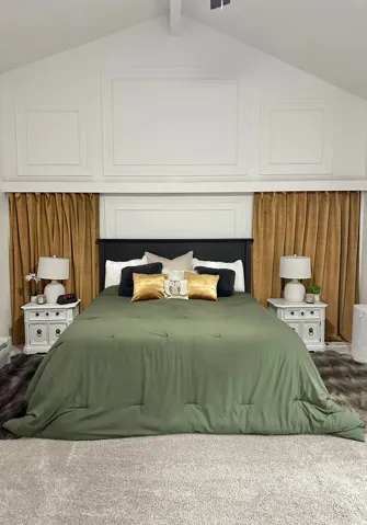 Vaulted ceiling featuring decorative wall molding
