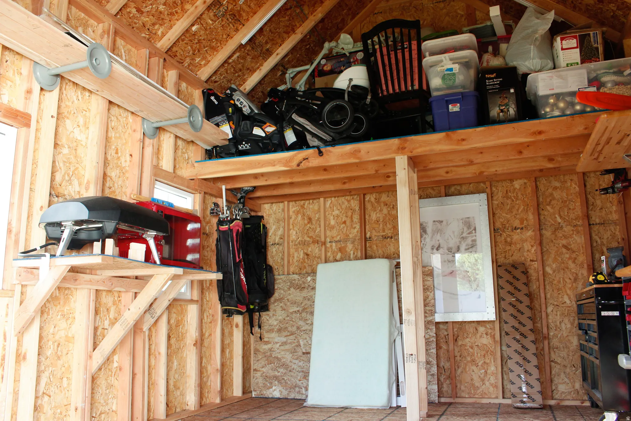 Very large storage shed with ample options for use. Storage mezzanine.