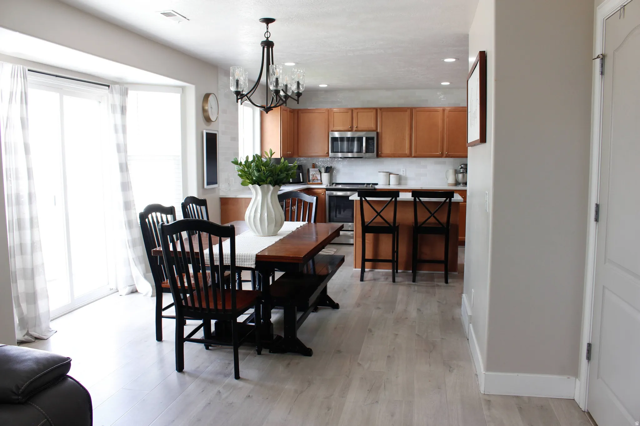 Bright and open-concept kitchen and dining area.