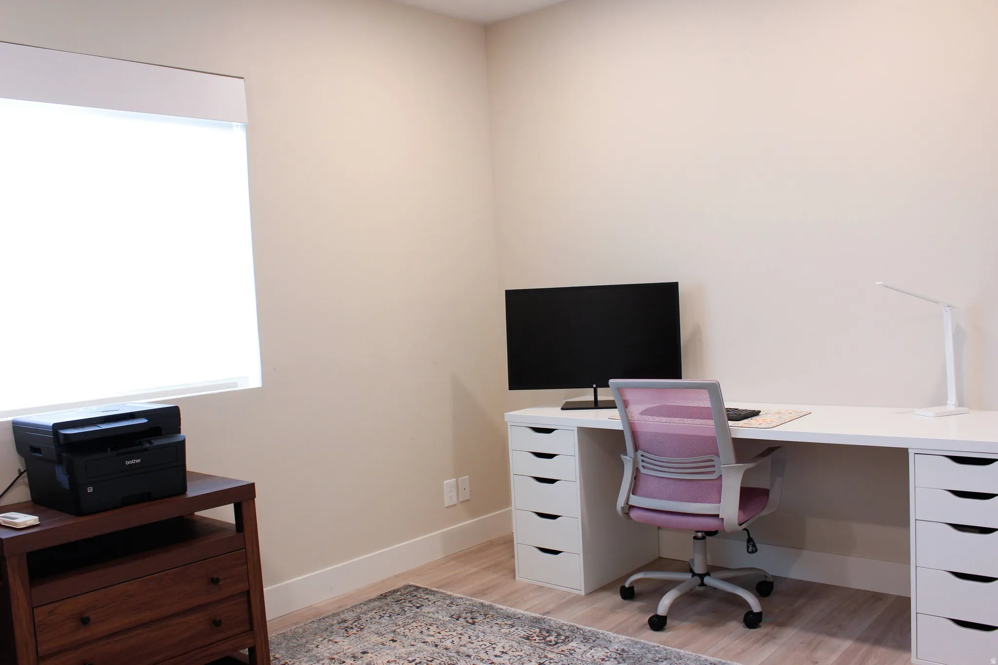 3rd floor bedroom currently being used as office/flex space. Mini split system to keep the temperature just right!