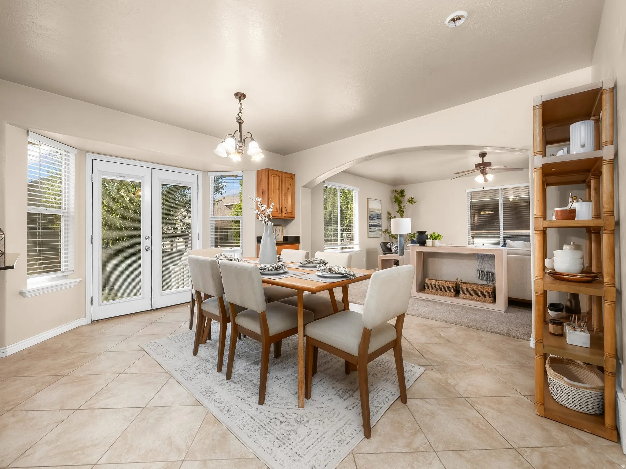 Dining area with doors to the patio and backyard.