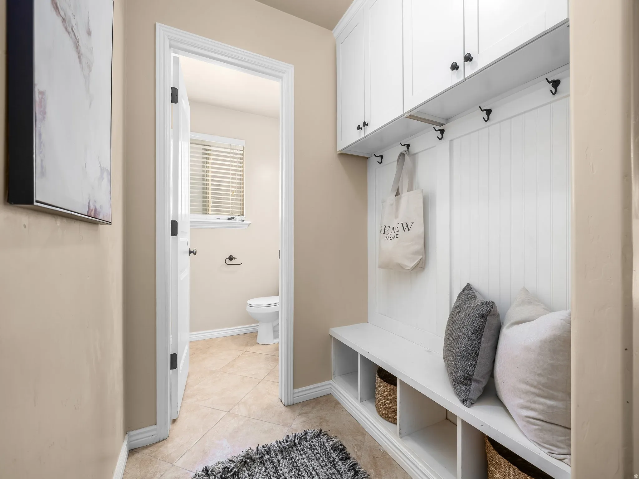 Mud room and guest bathroom.