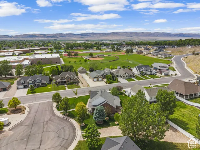 Residential neighborhood featuring varied architectural styles and mature landscaping