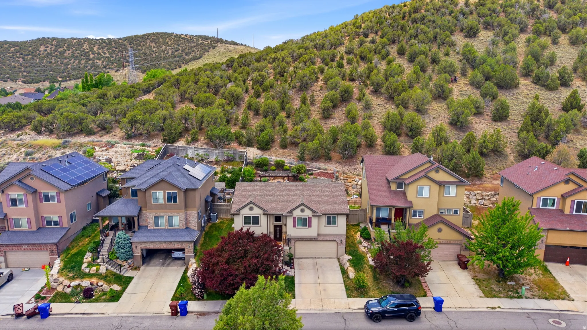 Two-story residence featuring a two-car garage, front porch, and biking trails in your backyard