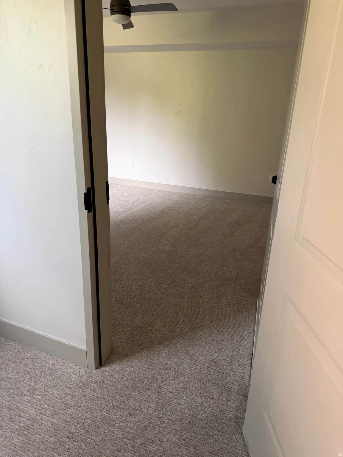 Neutral-toned carpeting throughout