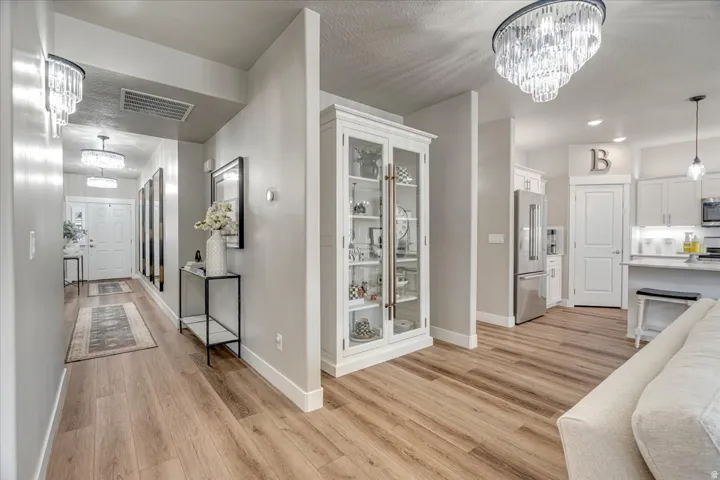View of front door from living area
