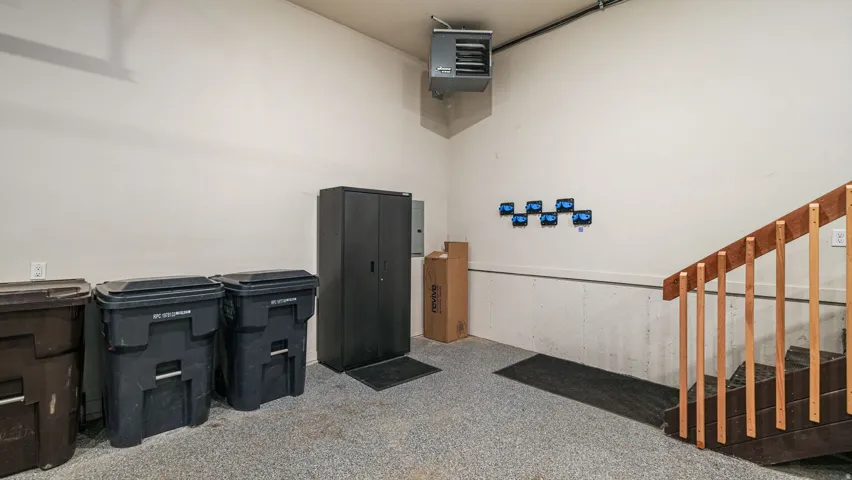 Garage interior featuring a durable epoxy-coated floor