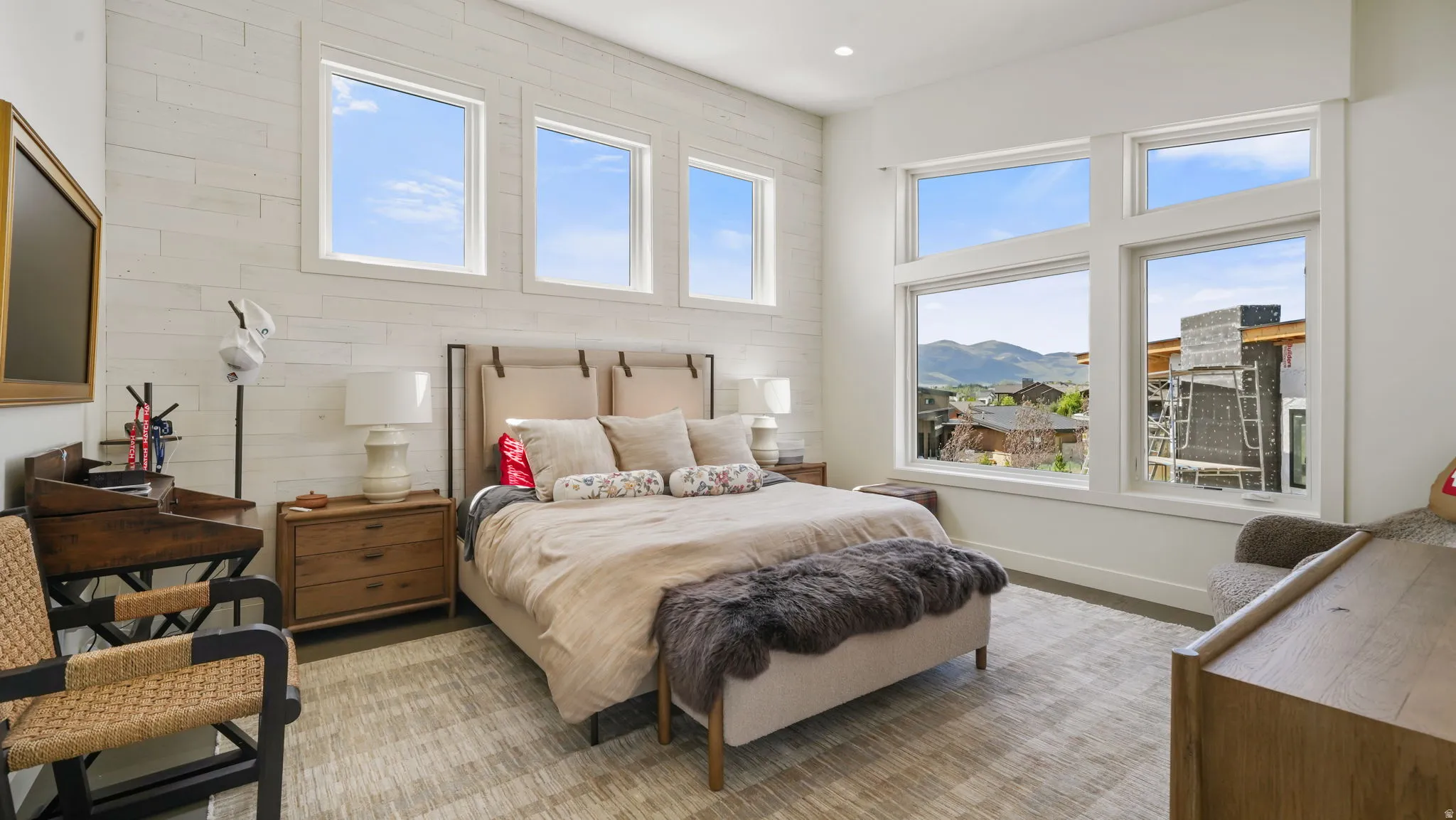 Expansive window array showcasing mountain scenery