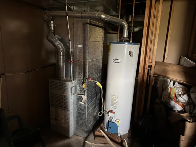 Forced air furnace and water heater installation
