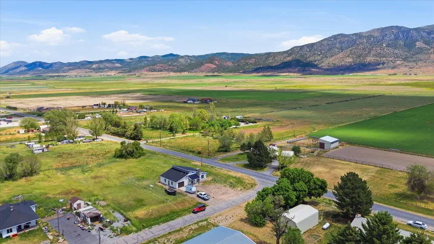 Expansive agricultural land with mountainous backdrop