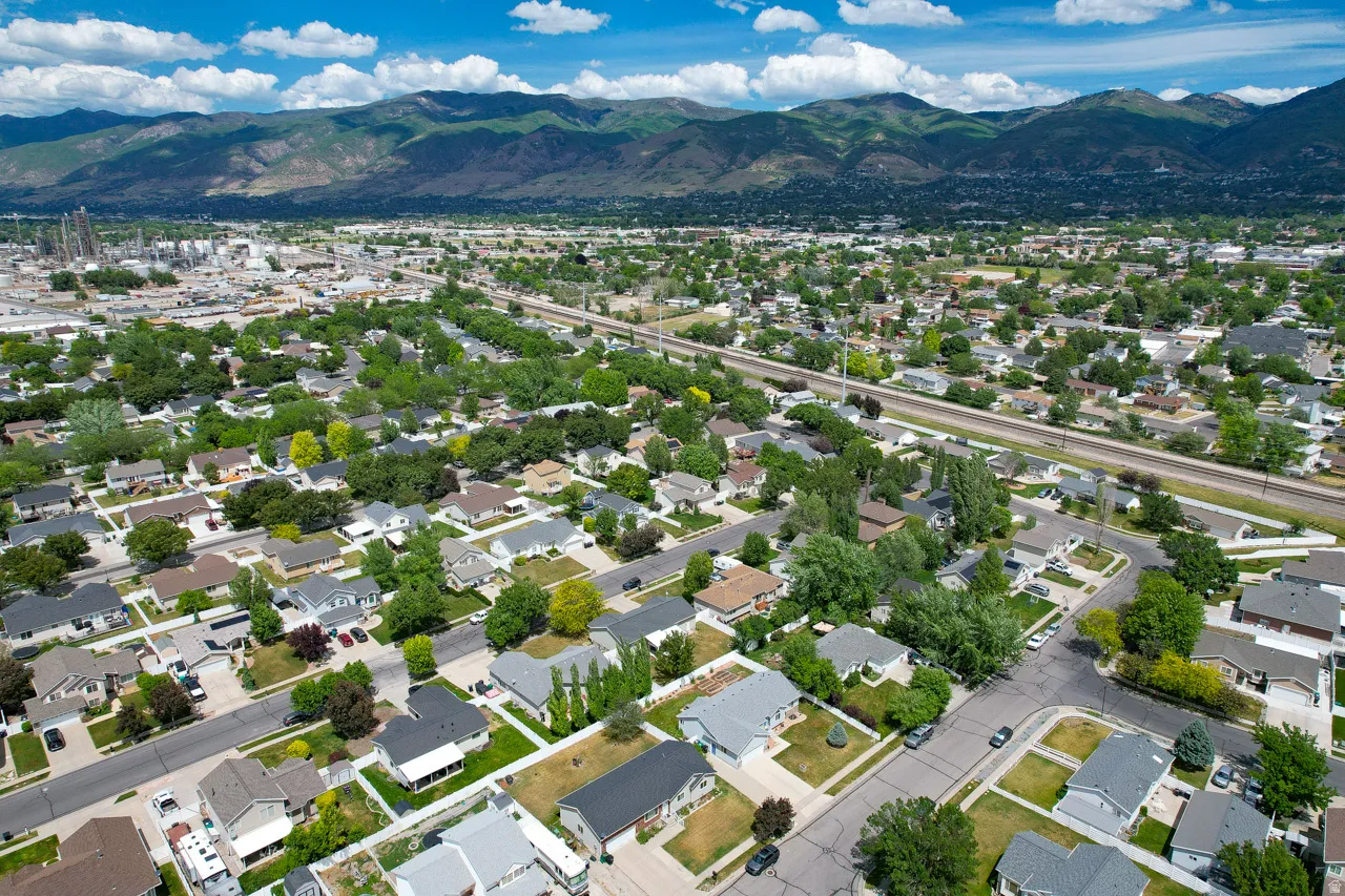 Aerial perspective showcasing a residential neighborhood with varied home styles