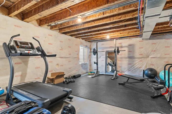 Unfinished basement with room for 1-2 bedrooms & full bathroom -or- 1 family room, 1 bedroom and bathroom.
