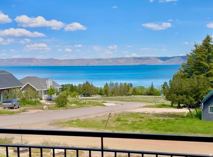Expansive water scenery framed by distant mountains