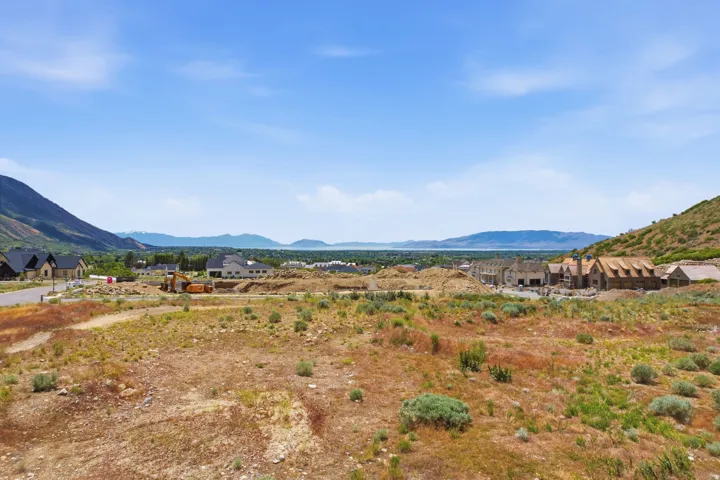 Expansive undeveloped land with a distant body of water