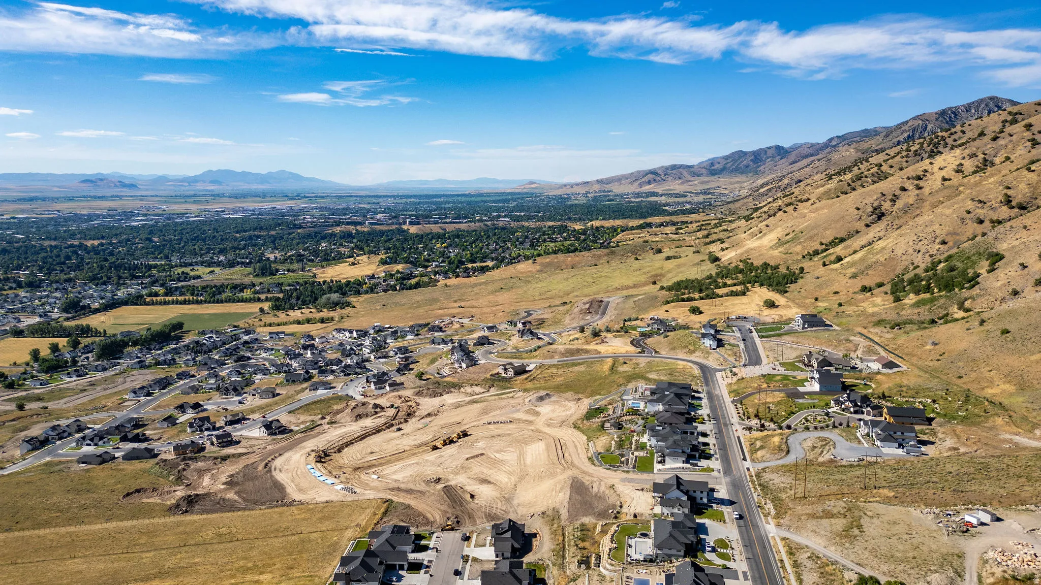 Expansive residential area featuring established homes and new construction sites