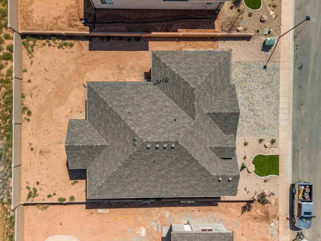 Pitched roofline with composition shingles